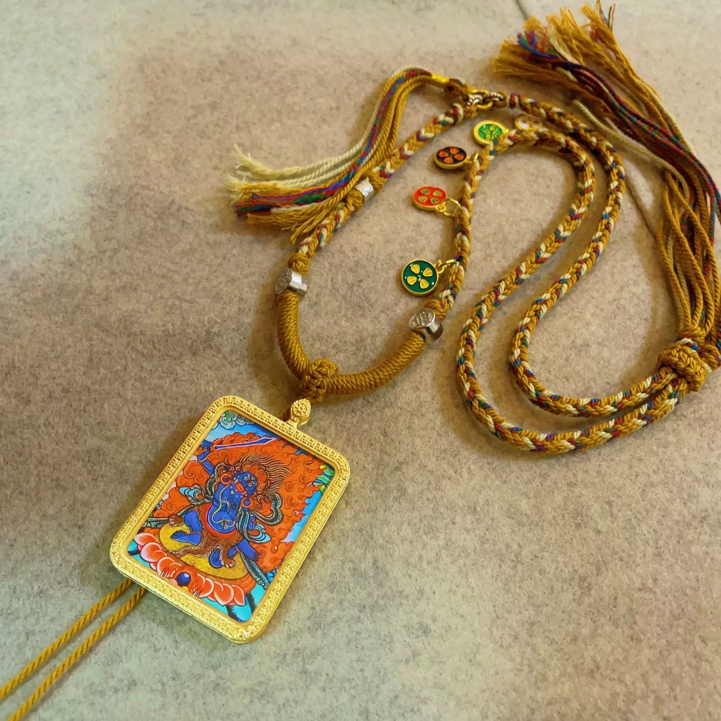 Acala (Fudo Myo-o) - Handcrafted Gold Tibetan Thangka Necklace with Soft Yarn Cord
