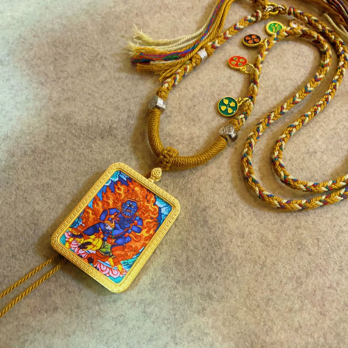 Black Jambhala (God of Wealth) - Handcrafted Gold Tibetan Thangka Necklace with Soft Yarn Cord