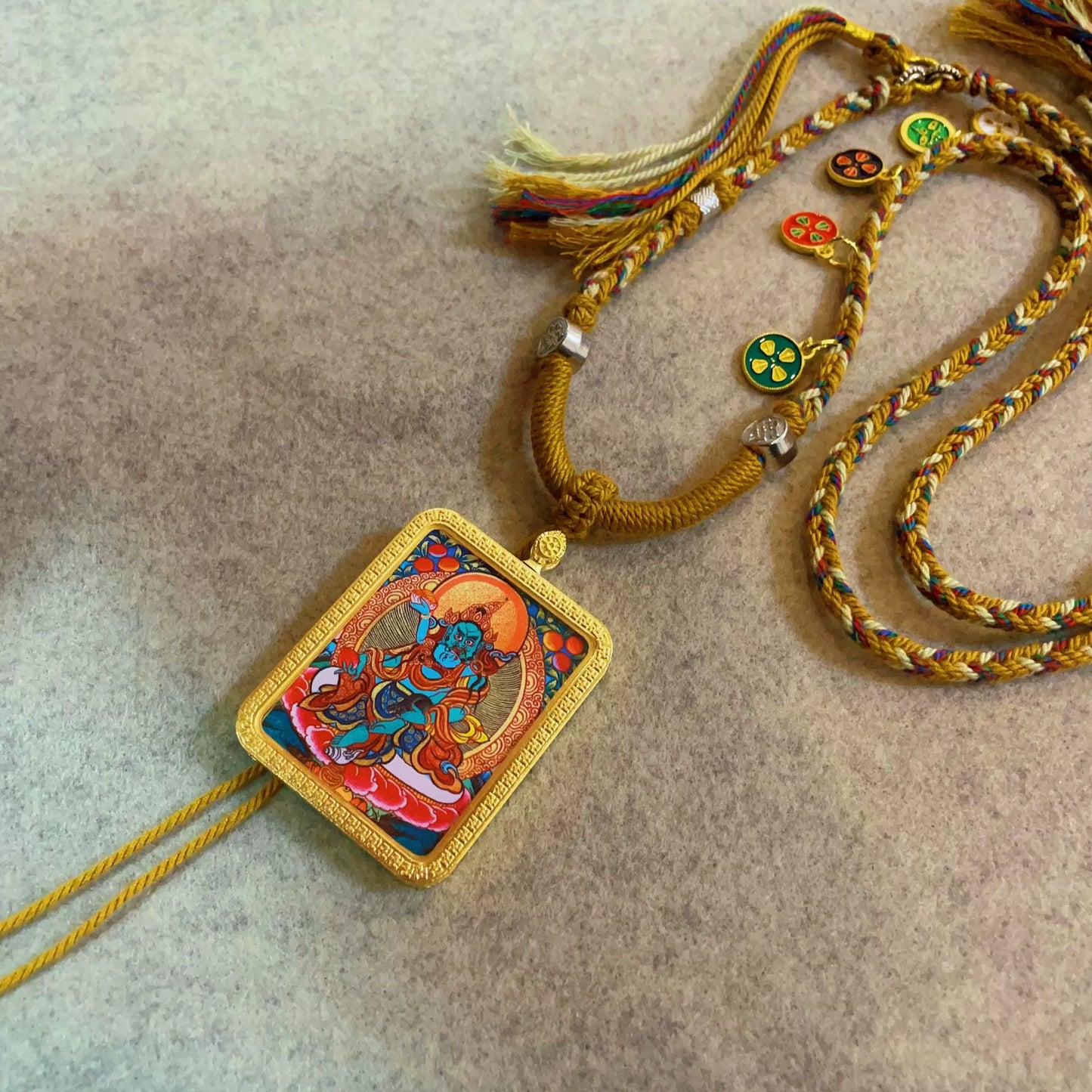 Green Jambhala (God of Wealth) - Handcrafted Gold Tibetan Thangka Necklace with Soft Yarn Cord