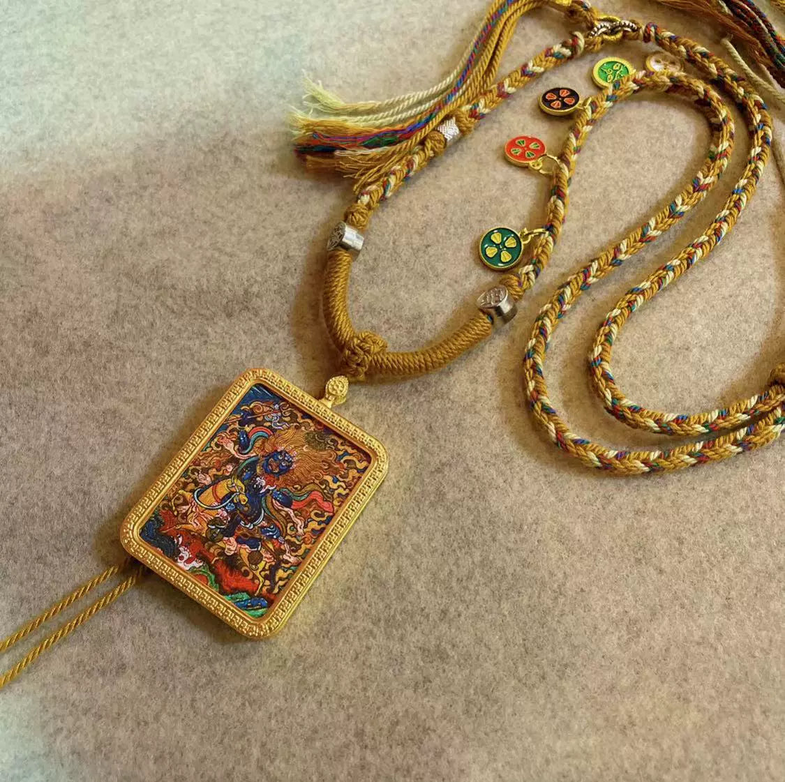 Palden Lhamo - Handcrafted Gold Tibetan Thangka Necklace with Soft Yarn Cord