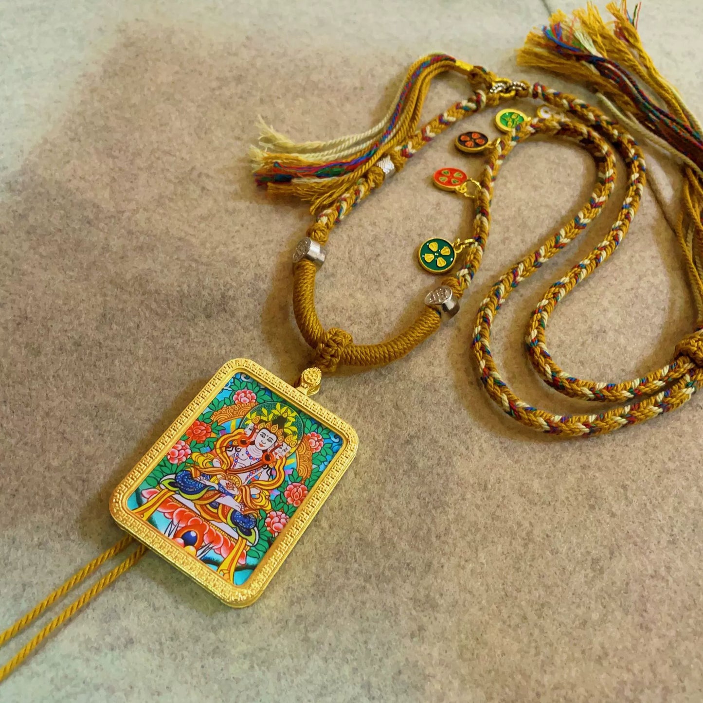 Vairocana Buddha - Handcrafted Gold Tibetan Thangka Necklace with Soft Yarn Cord