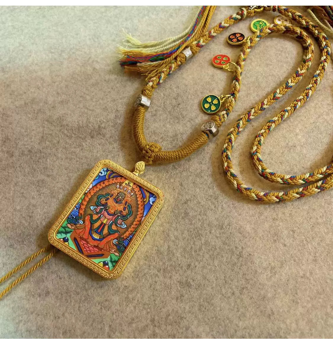 Zakhi Lhamo (God of Wealth) - Handcrafted Gold Tibetan Thangka Necklace with Soft Yarn Cord